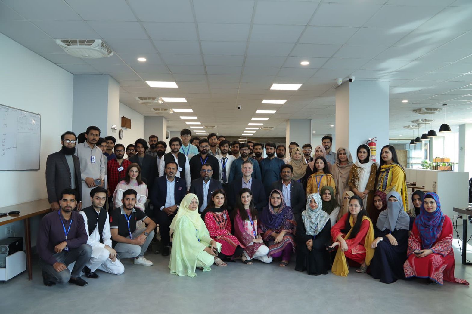 The GEC operations team — group photo with the U.S. Ambassador